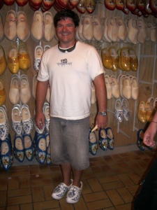 Daniel trying on some clogs